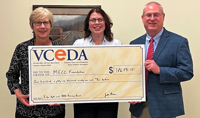 MECC President Kristen Westover and Vice President of Institutional Advancement Amy Greear receive the funds from VCEDA Executive Director/General Counsel Jonathan Belcher.  VCEDA PHOTO