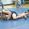 Canaan Spears maneuvers Battle’s Ryan Spates into position for a pin. PHOTO BY KELLEY PEARSON