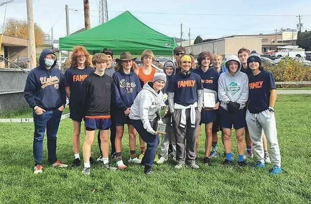 The Union boys cross-country team took the Region 2D trophy for the third year in a row on Wednesday. PHOTO BY KELLEY PEARSON