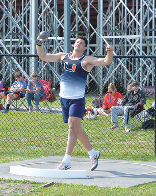 Union’s Gabe Sneed pulled the second place medal in shot put before bringing home the discus title. PHOTO BY KELLEY PEARSON