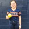 Union’s Addison Toney poses with her home run ball after Tuesday’s walk-off game winner. PHOTO BY KELLEY PEARSON