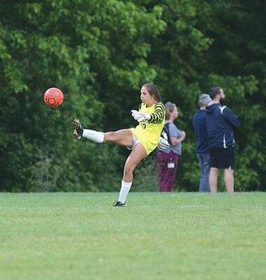 Goalie Gracie Gibson punts the ball after another dramatic save Tuesday. PHOTO BY KELLEY PEARSON