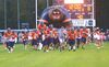 The Bears take the field. PHOTO BY KELLEY PEARSON