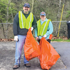 Brian Falin, the Appalachia coordinator for the town’s Great American Cleanup anti-litter campaign, poses Saturday with another volunteer. More than 150 volunteers took to the roads, streams and woods to clean up litter in Appalachia, Big Stone Gap, Coeburn, Norton, Pound, St. Paul and Wise. Approximately 300 bags of litter were filled. ‘We're really pleased with the number of people that came out,’ said Wise County Litter Prevention Coordinator Greg Cross.  SUBMITTED PHOTO