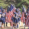 The Union High School Bears took the field Saturday for the Region 1D quarterfinal game carrying flags in honor of veterans on Veterans Day, as captured in this photo by Donald Ratliff. Thank you, veterans, for all you did, and thanks, Donnie, for all you do!  DONALD RATLIFF PHOTO