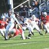 Union’s Bradley Bunch breaks a tackle on his way to the first score of the day. RICHARD MEADE PHOTO